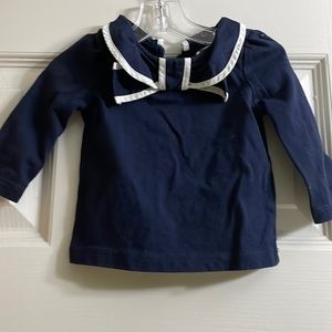 Janie and Jack navy blue toddler top with bow design at neckline.